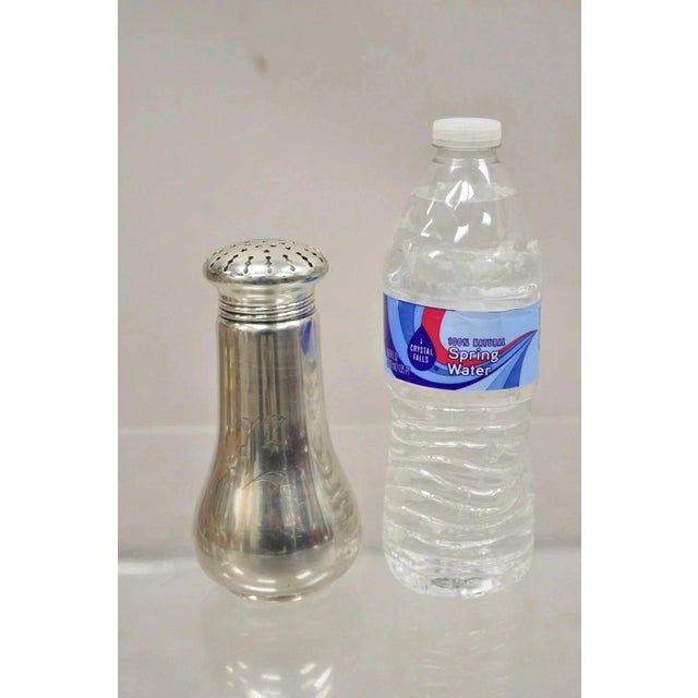 Antique Wilcox SP Co. 4281 Silver Plated Seasoning Spice Shaker "E" Monogram. Circa Early 20th Century. Measurements: 6" H...