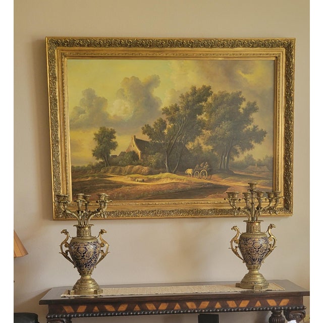 Elevate your interior with this exquisite multi-arm candelabrum set, a richly detailed piece that evokes the elegance of...