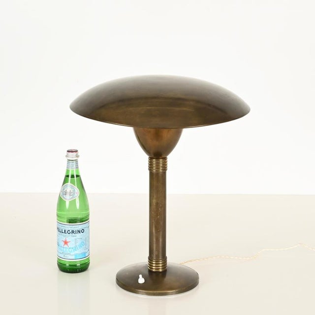 Stunning italian art deco mushroom-shaped table lamp fully made in brass. This incredibly rare and elegant lamp was...