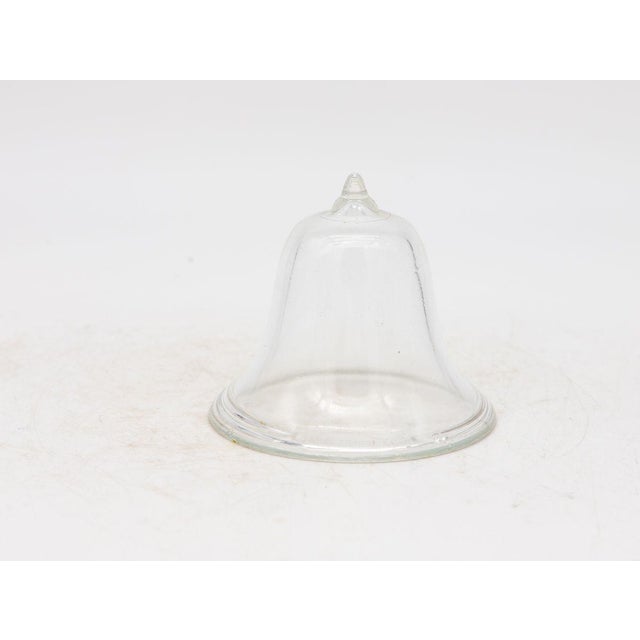 A set of three mini glass cloches. Ideal table top or bookshelf size. French midcentury. Wear consistent with age and use....