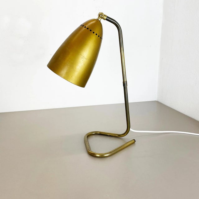 table light Origin: Austria Age: 1950s This original vintage table light was designed and produced in the 1950s in...