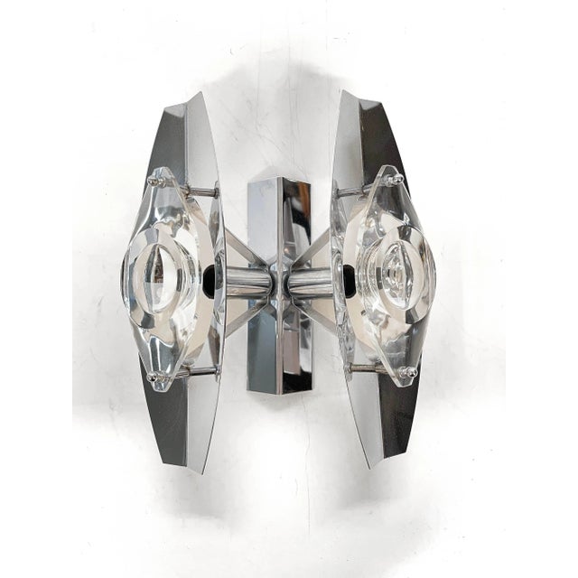 A beautiful double tile steel and glass wall lamp from the 1960s. This applique was designed by Oscar Torlasco for...