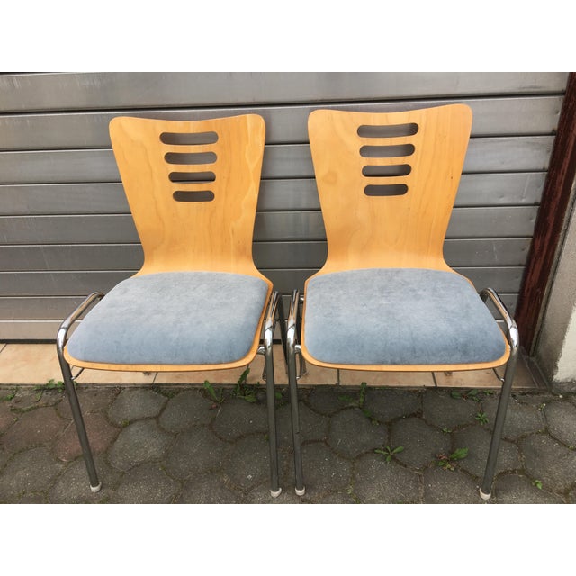 Stackable chairs with a chrome four-legged frame, ø = 20 x 1.5 mm, 2 stable crossbars under the seat with 4 fixing points....