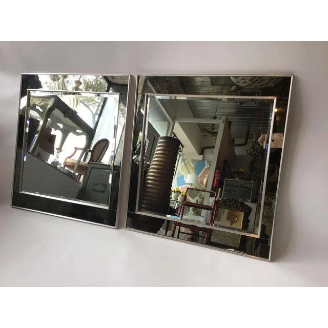 Pair of 1970s oversized chic, La Barge chrome framed mirrors. Smoked mirror border .Great quality. Out of a Southampton,...