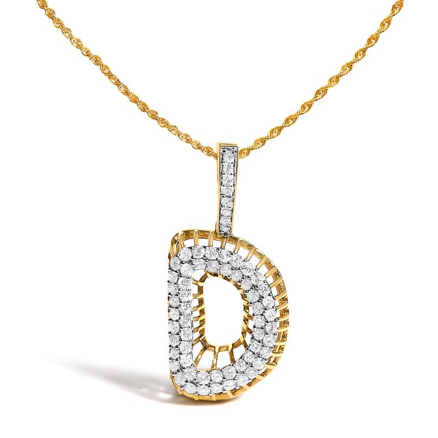 This men’s 10K yellow gold diamond initial pendant necklace features a bold uppercase letter D design set with 1 1/5 cttw...