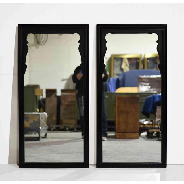 Elegant and iconic, this pair of mid-century chinoiserie mirrors from the celebrated Chin Hua Collection by Raymond Sobota...