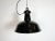 Industrial black enamel pendant light made by Elektrosvit in former Czechoslovakia during the 1950s. White enamel inside...
