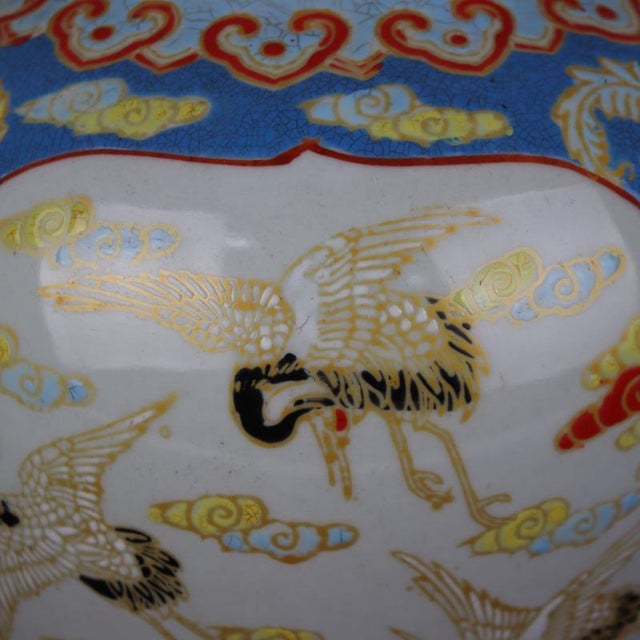 H-40.2cm,W-22cm. This Chinese ceramic pot from the Qing Dynasty features a Qianlong mark and a stunning blue ground with...