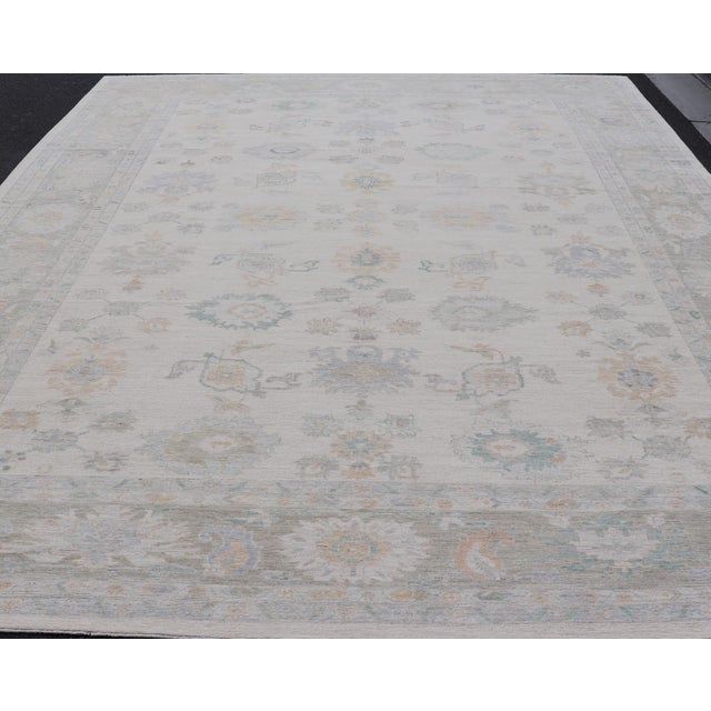 Oushak Rug With Ivory Soft Pastel Accents in Sage, Peach, and Blue 12'3 X 17'10 For Sale - Image 4 of 11