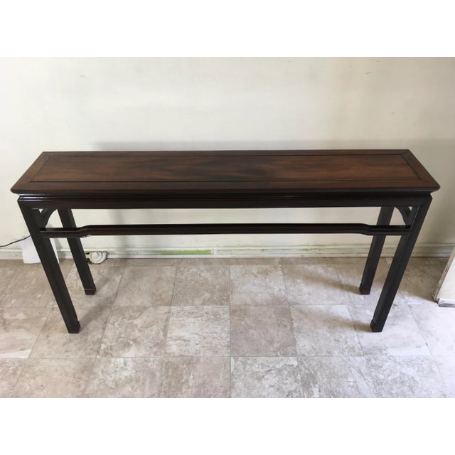Solid rosewood Chinese console with fine detailing. Gorgeous solid Rosewood construction and simple and clean details...
