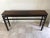 A beautifully crafted Chinese rosewood console table distinguished by its elegant proportions, exceptional craftsmanship,...