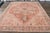 Antique Persian Heriz Wool Rug Handmade in Red Featuring a Medallion Motif For Sale In New York - Image 6 of 10