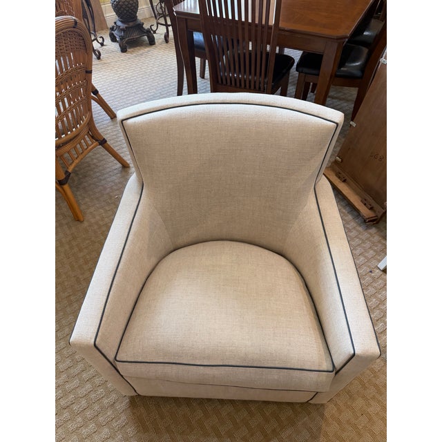 Elevate your living space with this sophisticated A. Rudin Model 712 swivel armchair, a masterclass in contemporary...