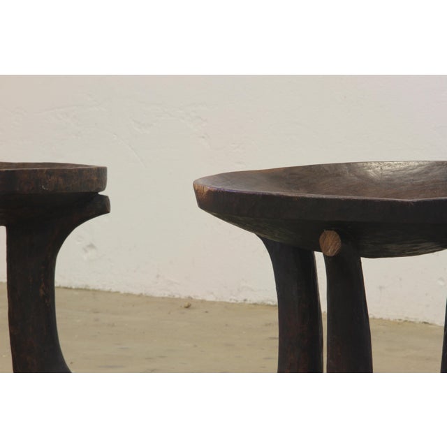 Original hand-carved Oromo stool from Ethiopia, early 20th century. Crafted from a single piece of wood, it features a...