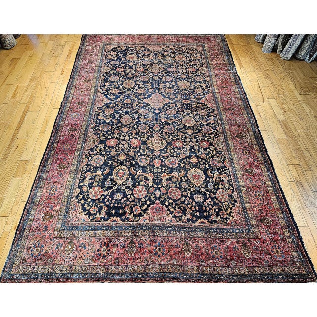 "This 19th century oversized Persian Farahan Sarouk rug is a majestic example of classical Persian weaving, inspired by...