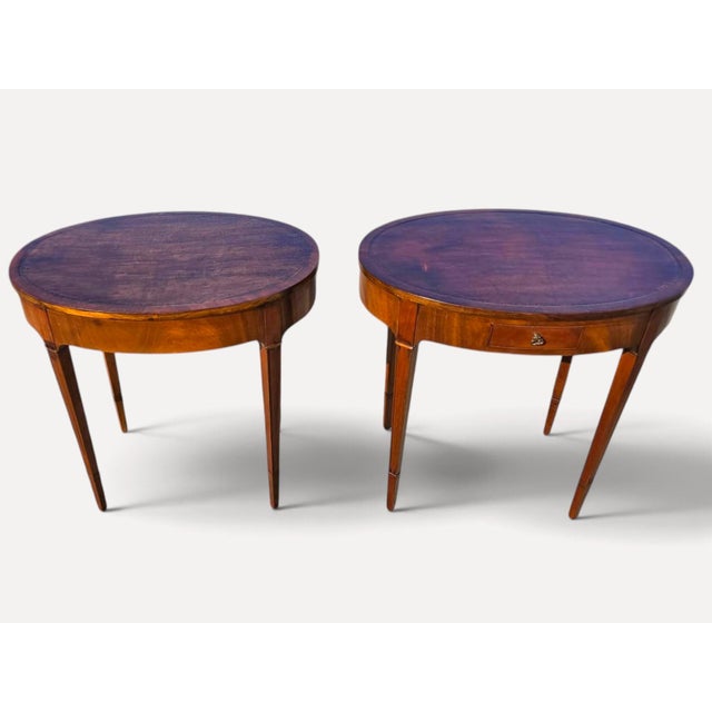 The 920 English Sheraton mahogany leather top side/sofa tables are antique accent tables fully assembled with elegant...