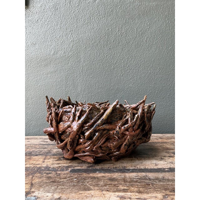 This vintage rustic ceramic twig bowl is a striking example of handcrafted artistry inspired by natural forms. Likely...