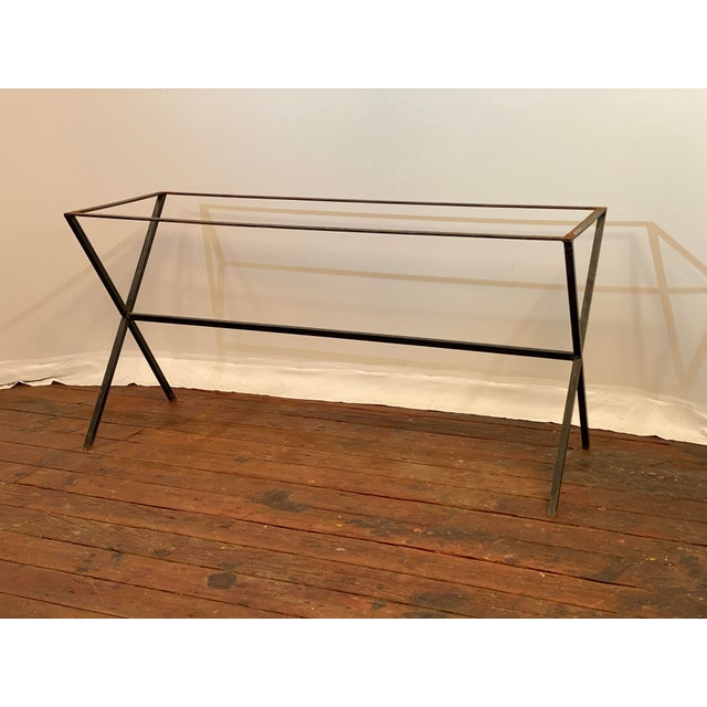 Patinated square stock steel saw buck console table base. Circa 1960-70. Large enough and depending on the top selection...