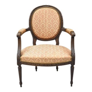 Antique French Louis XVI Style Bow Carved Walnut Fauteuil Fireside Arm Chair For Sale