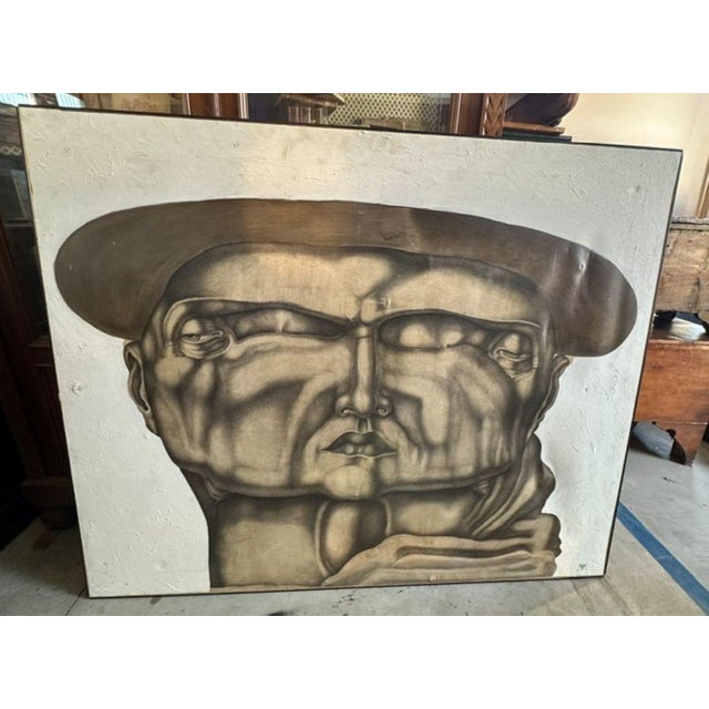 A mid-20th-century canvas painting, it depicts an imposing male face characterized by a powerful optical illusion and...