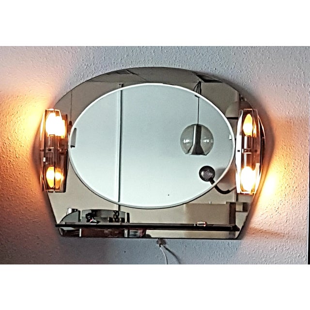 Mid-Century Italian Modern Mirror with Lamps, 1970s, in Very Good conditions. Designed 1970 to 1979