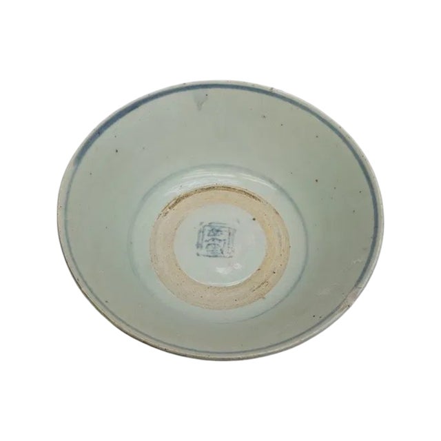 An impressive large antique Chinese Ming Dynasty blue and white porcelain bowl, dating to approximately 1600 AD....