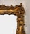 Magnificent Regency style giltwood overmantel mirror, of impressive scale and richly carved form, with a superbly...