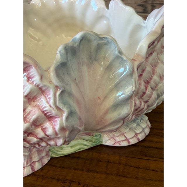 A striking mid-century Italian majolica ceramic centerpiece bowl sculpted in a dramatic, organic grotto style. This...