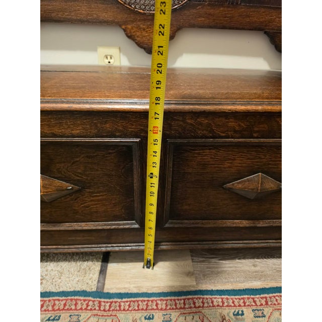 Antique Oak Hall Bench Features Intricate Carvings and a Circular Cane Insert in the Backrest, Late 19th Century For Sale In Cleveland - Image 6 of 9