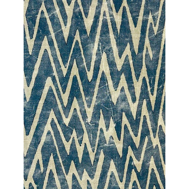 An Art Deco inspired irregular chevron design printed on a viscose and linen ground. Great for windows, pillows or light...