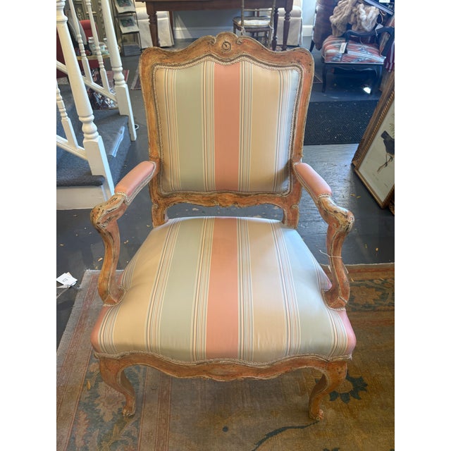 This is a pair of Antique open armed Louis XV Style Chairs. They are circa 18th Century. They have been newly...
