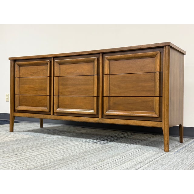 -MCM 9-Drawer Dresser -MANUFACTURE: Unknown -IN THE STYLE OF: Mid-Century Modern -DATE OF MANUFACTURE: 1960's -MATERIALS:...