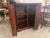 This traditional-style cabinet is designed for versatility, featuring an expandable top that slides open to provide a...