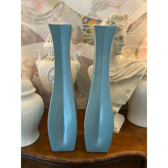 Absolutely striking pair of monumental sculptural vases in the most soothing shade of turquoise/sky blue. Texture and...