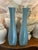 Absolutely striking pair of monumental sculptural vases in the most soothing shade of turquoise/sky blue. Texture and...