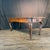 Classic handsome early 19th century French dining table with a broad rectangular plank top, two generous drawers and...