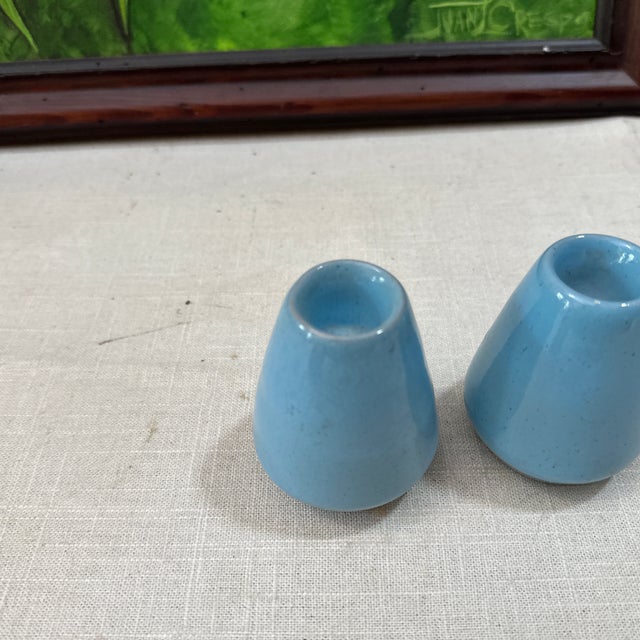 Up for consideration is a beautiful pair of blue ceramic candlestick holders. These would look lovely in your home and...