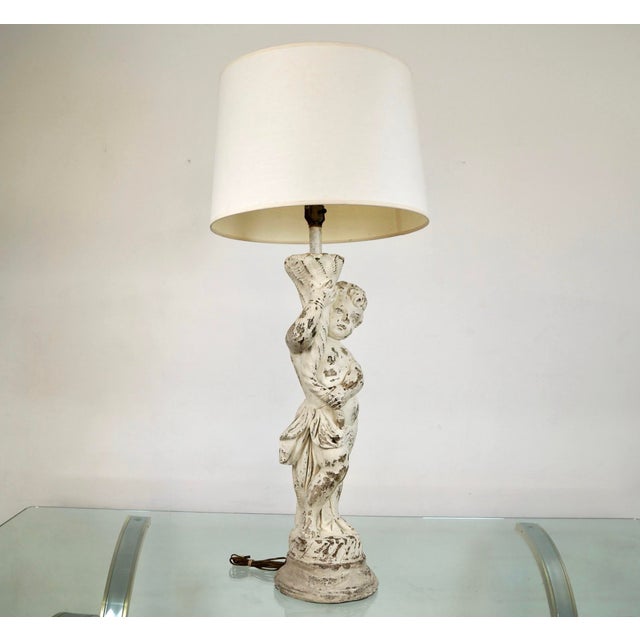Vintage 1960's table lamp for sale. It's really solid and well made, and is made of poured concrete. It has a molded...