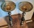 Market found, I love the large scale and vintage nature of these weathered brass candleholder offer. No makers mark.