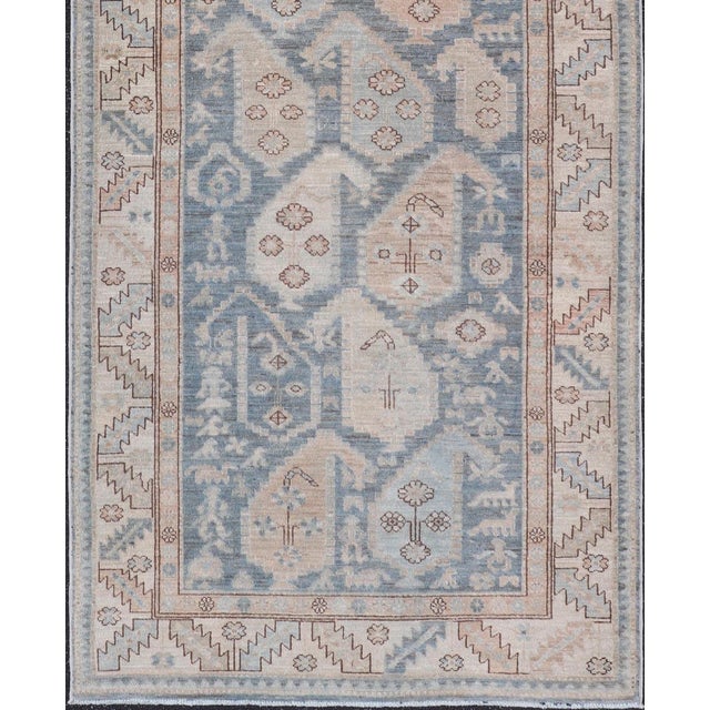 Measures: 4'0 x 9'10 Afghanistan Tabriz Gallery Runner with Soft Blue Field and Ivory Motifs. Keivan Woven Arts /...
