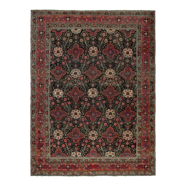 Antique Persian Rug in Black With Red Floral Patterns - by Rug & Kilim For Sale