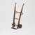 Characterful early 20th-century hand truck crafted from solid wood and iron. The piece features a tall wooden frame...