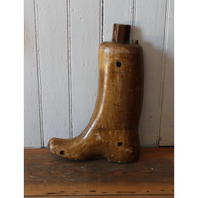 Beautifully crafted antique cobbler's boot form. Circa early-mid twentieth century. Solid and weighty, this is a beautiful...