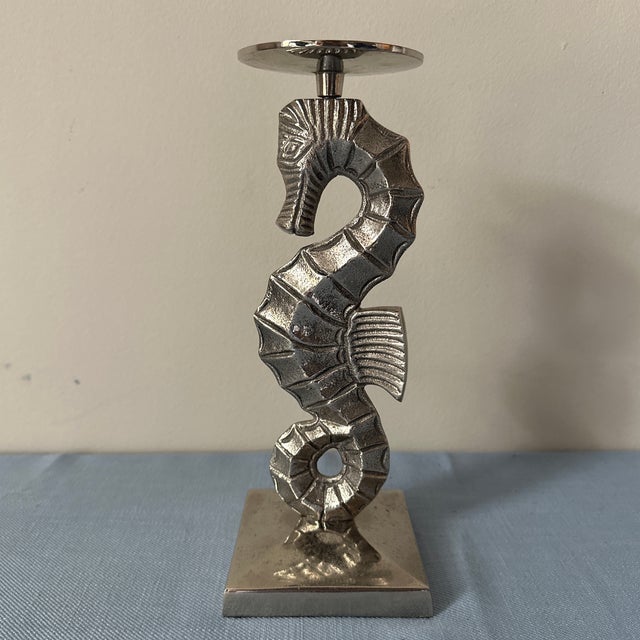 Barclay Butera silver seahorse candle holder. Makers mark on bottom.