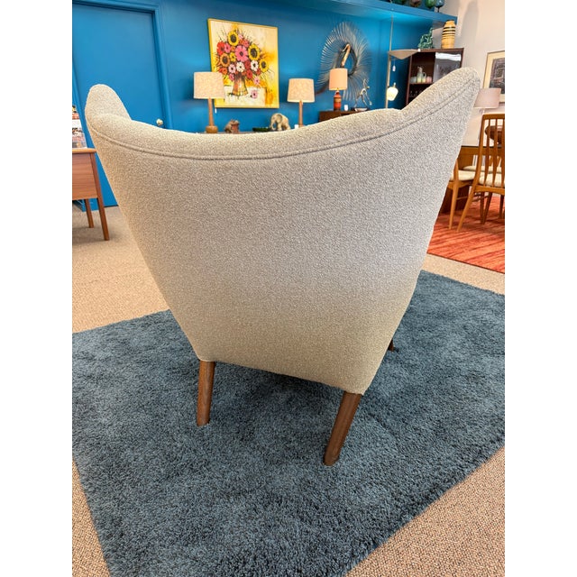 We have a 1959 Danish Papa Bear chair possibly by Hans Wegner. We purchased this chair with many other pieces that were...