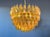 It sounds like you have a stunning piece of art with that Italian pendant light! The combination of 111 amber Murano...