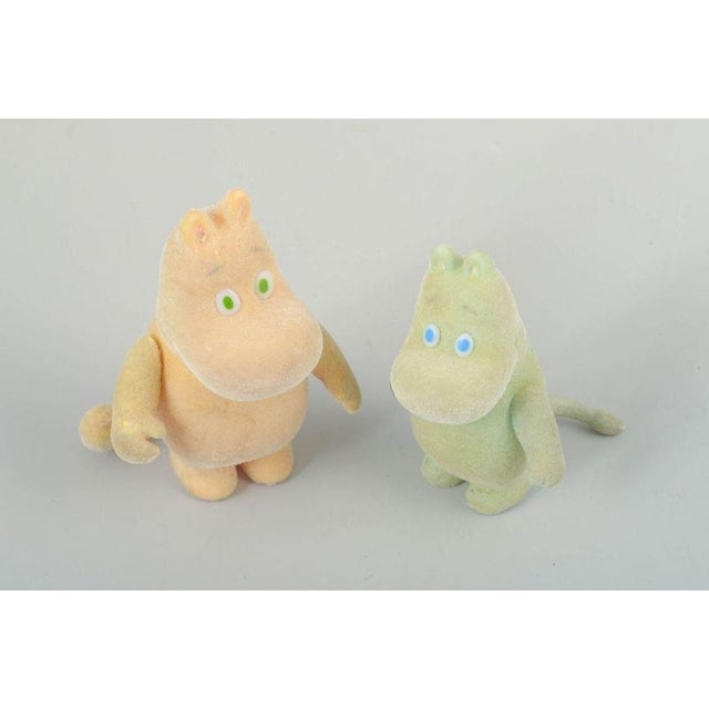 Two moomin figures, martinex, finland, c. 1980s. Set of two standing moomin figures in soft plastic with a flocked velvet...