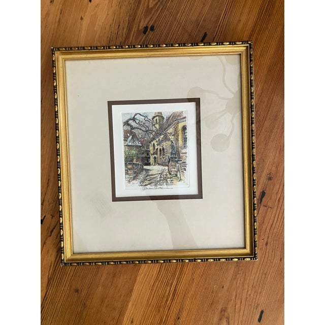 Robert Kasimir was a listed print maker best known for his colored etchings of scenes around Austria. This scene is of a...