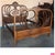 Designed by j & j kohn, this mahogany stained bentwood bed features curved head and footboards swelling with decorative...