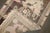 A 2nd quarter of the 20th-century feminine colored Tibetan rug with a dragon motif on a brown color field. Size: 3'1'' x...